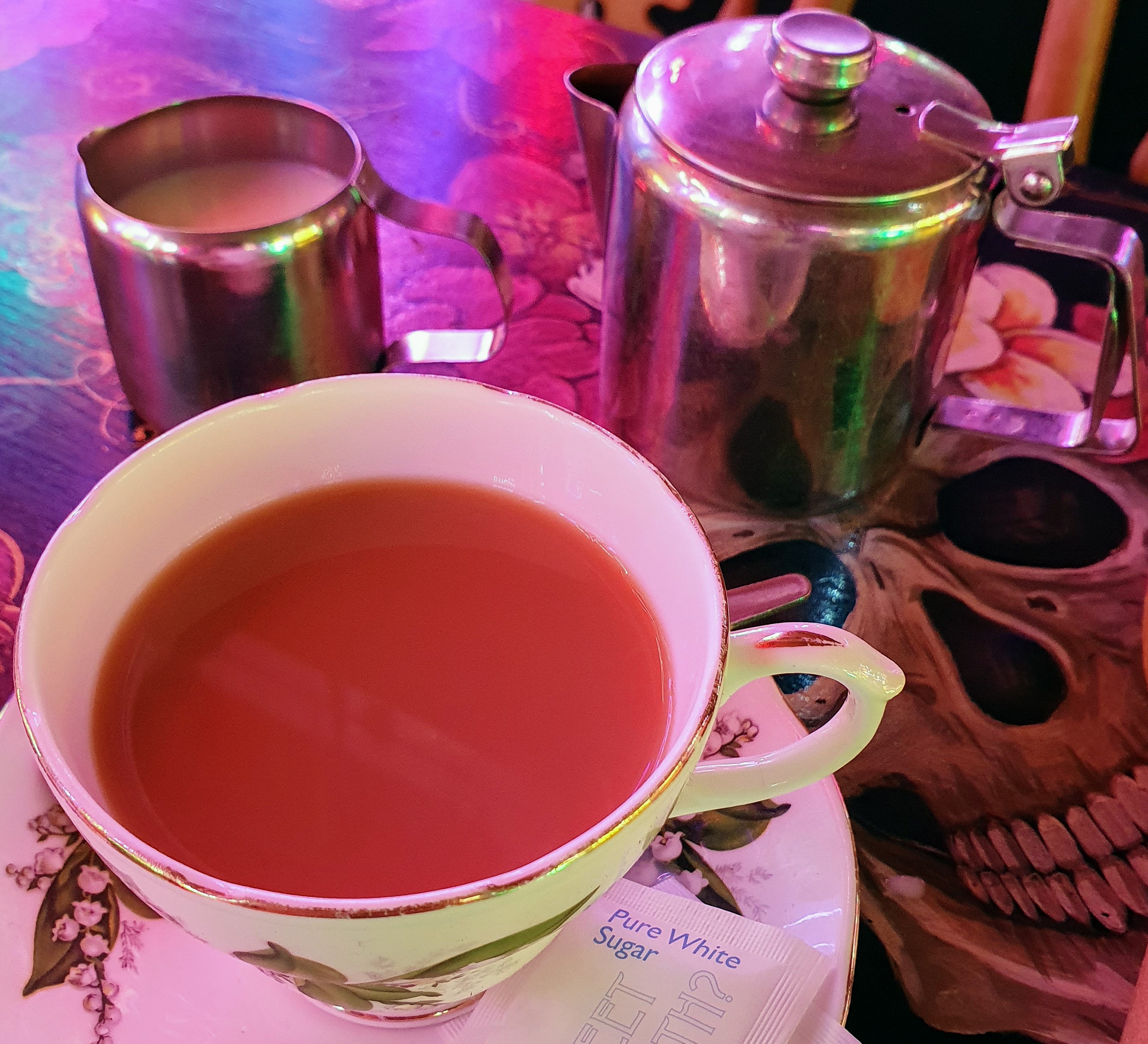 Tea cup and tea pot next to skull design at God's Own Junkyard, Walthamstow, London