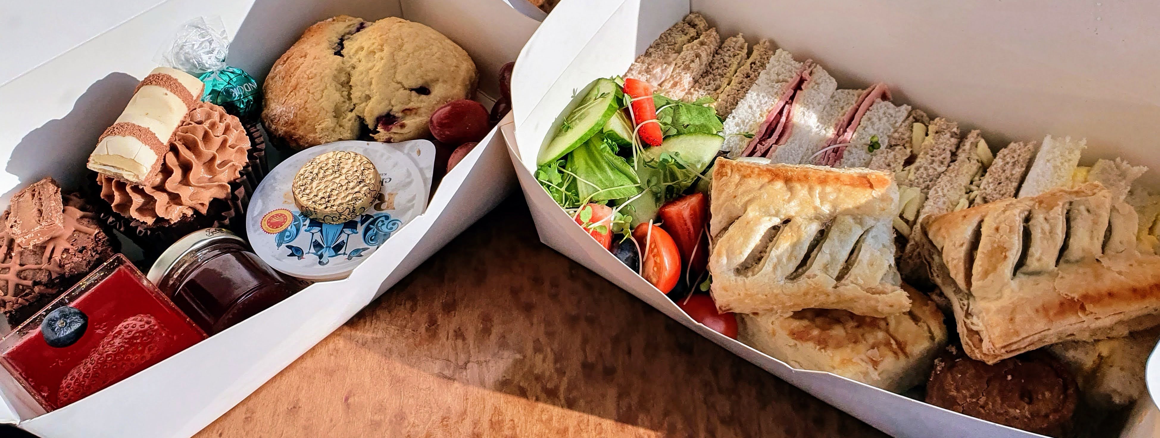 Takeaway afternoon tea with a scone, cupcake, brownie, jelly sandwiches and sausage rolls from Dolly Birds Mobile Catering, Staffordshire