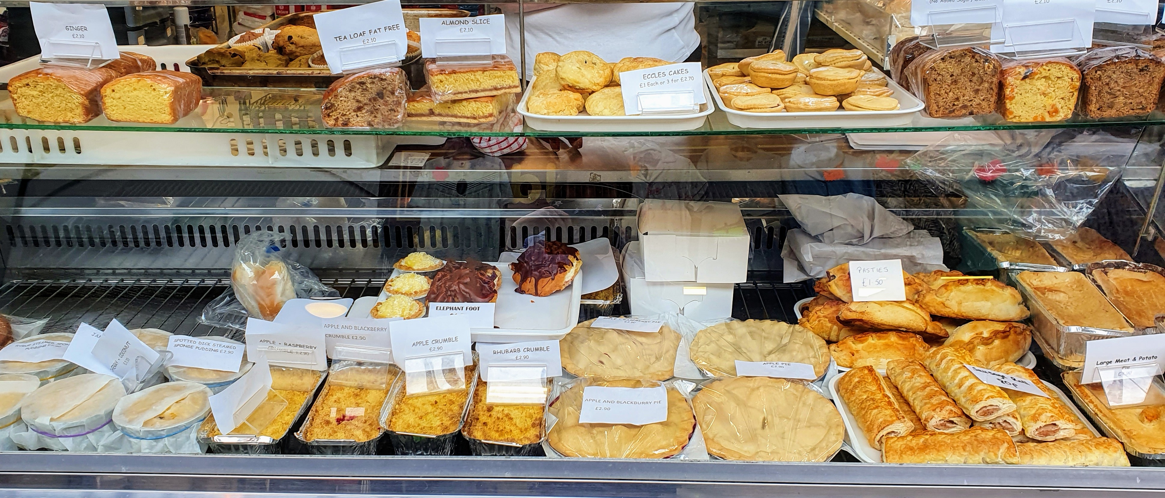 Sausage rolls, pies and cakes for sale inside the Butter Market, Leek, Staffordshire