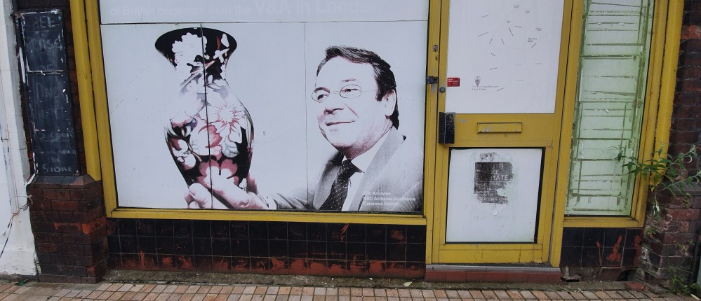 Portrait of Eric Knowles in abandoned shop window, Hanley town center, Stoke-on-Trent